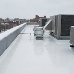 Emergency roof repair fixing a leaking roof during winter weather with EPDM coatings