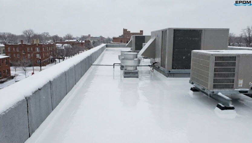 Emergency roof repair fixing a leaking roof during winter weather with EPDM coatings