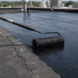 EPDM rubber roof repair with liquid coating to fix cracked seams and prevent leaks