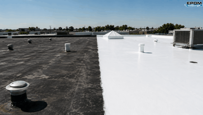 Professional roofer applying reflective EPDM roof coating for UV protection and energy savings